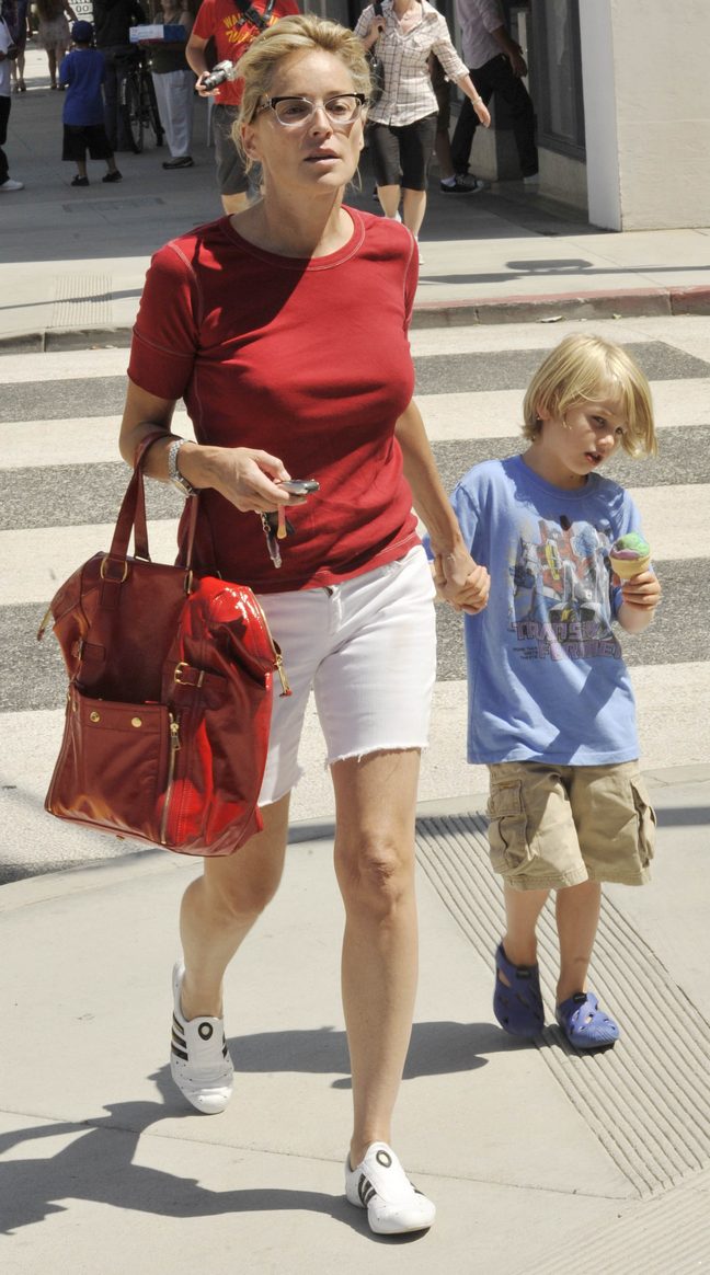 Sharon Stone, eyeglasses, white shorts, red tshirt, tennis shoes, red tote bag, purse, keys